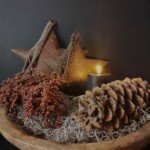 Roestige ster aan koord 20cm