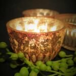 Roestkleurig glazen theelichthouder met goudaccenten – sfeervol en warm