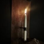 Roestige wandkandelaar