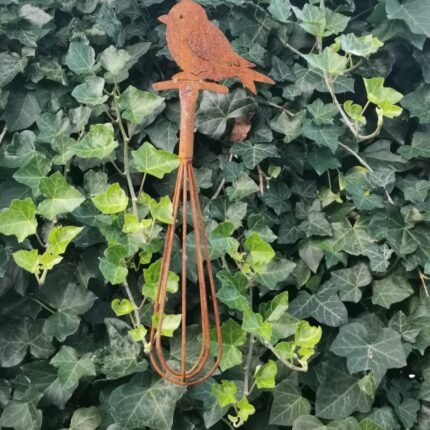 Voederstation met vogel op garde