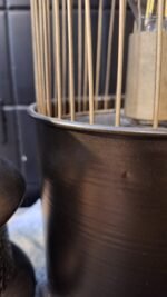 Detail van de draadkap en fitting