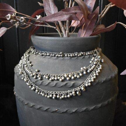 Kruikketting munten met touw
