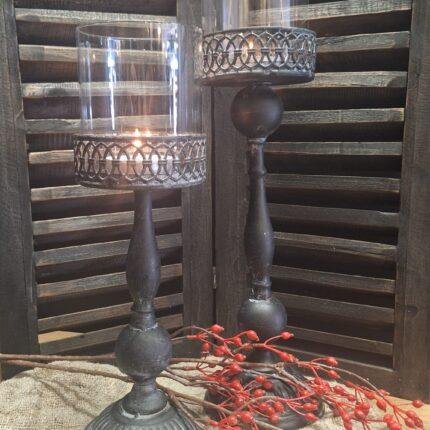 Grijze kandelaar incl glas met brandende kaars