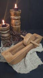 Houten knoflookpers