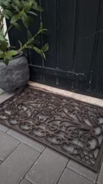 gietijzeren deurmat sober wonen