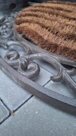 landelijke entree mat met krulmotief