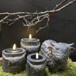 Grote landelijke theelichthouder met Schotse Hooglander