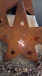 Roestige kerstster voor warme sfeer