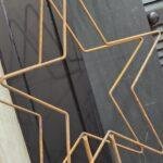 Roest ster op beton voet