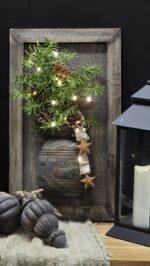 houten wanddecoratie met pot voor styling