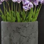 Grijze ovale vensterbankpot