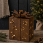 Roest metalen cadeau met sneeuwvlokken – kerstdecoratie met LED